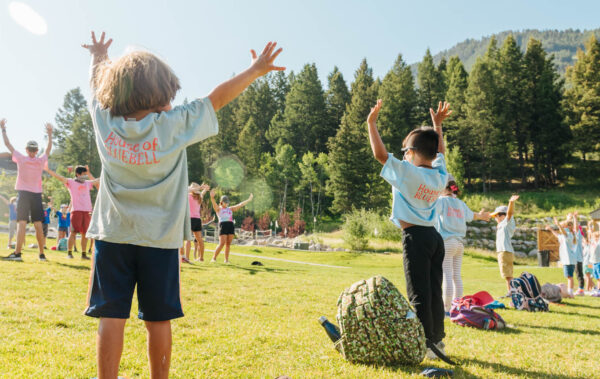 Campers outside playing games at Basecamp