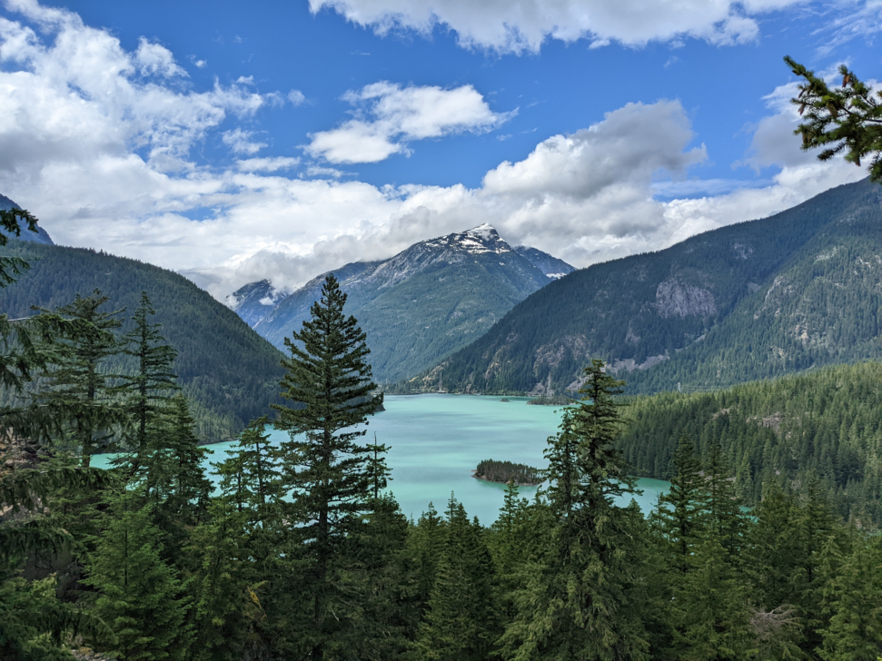 Landscape of a bright blue alpine lake.