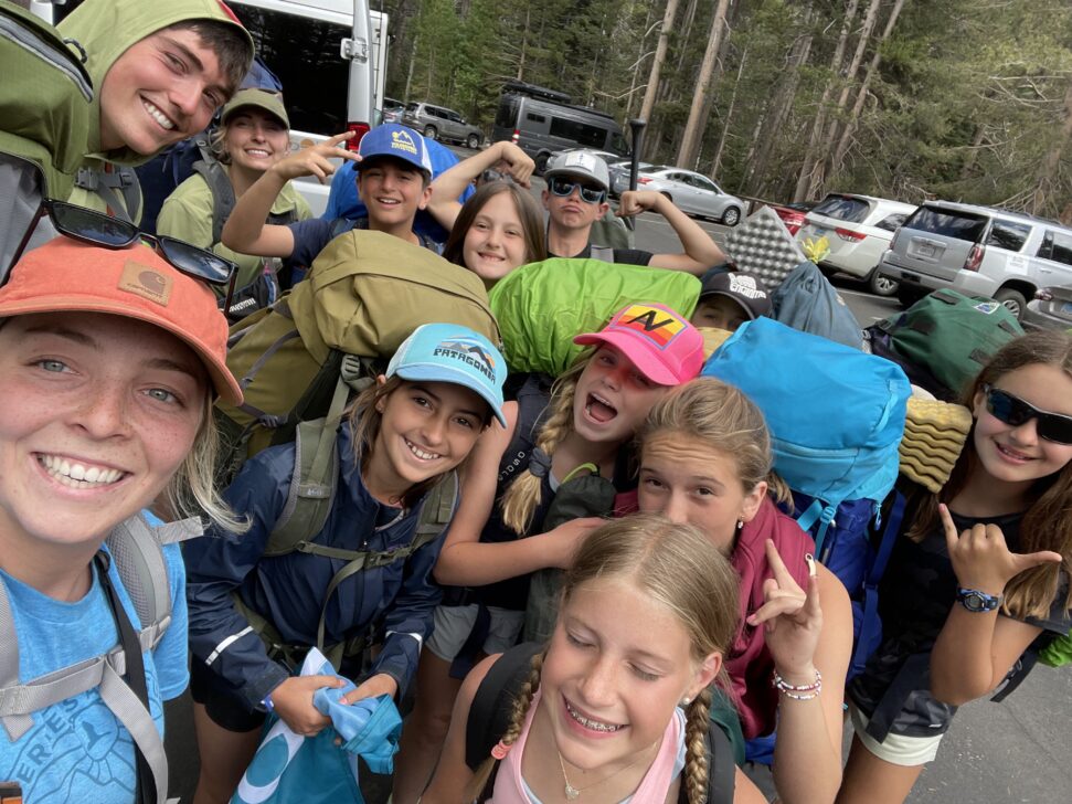 selfie of a group getting ready to backpack