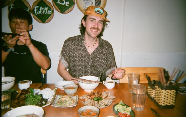 Man eating a Vietnamese meal.