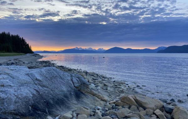 Colorful sunset over the shoreline of Alaska.